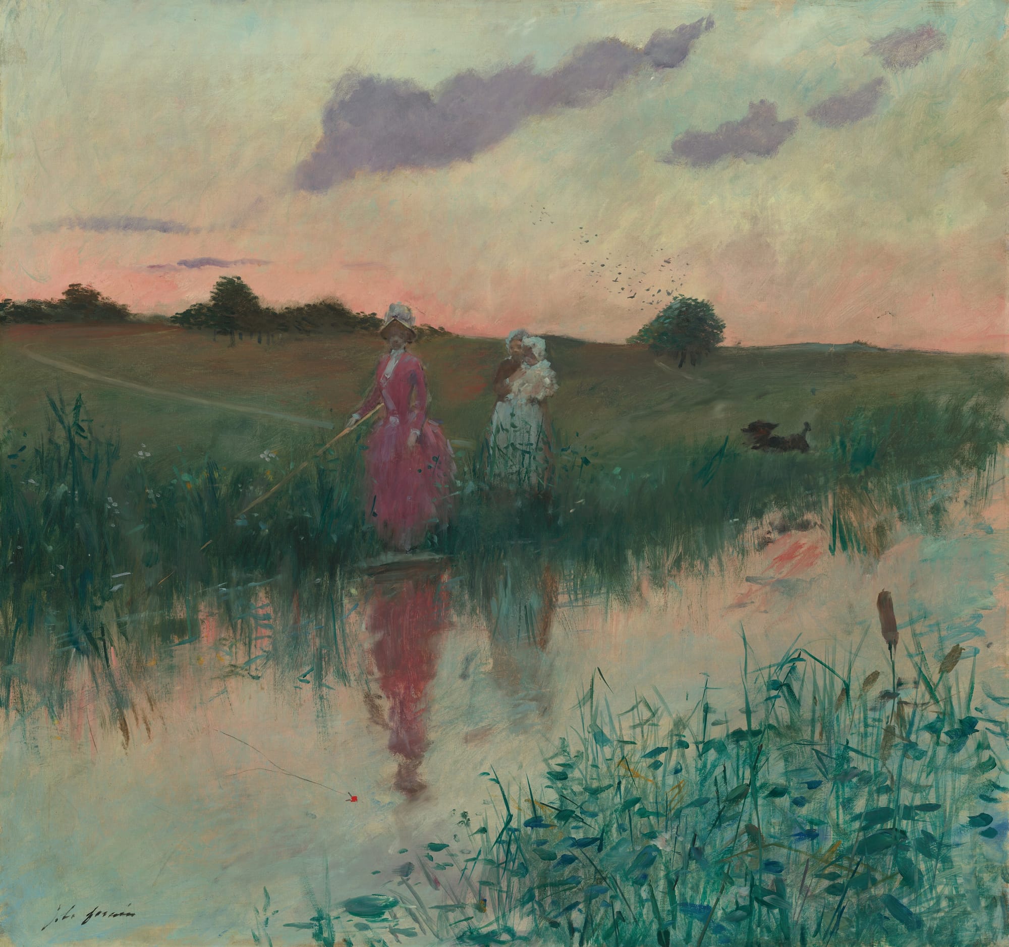 Two women stand on the edge of a river at sunset. One, in a pink dress, holds a fishing rod. The other holds a child.